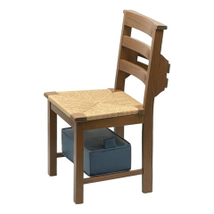 Traditional chair with third stretcher, bookrack, and blue stored hassock